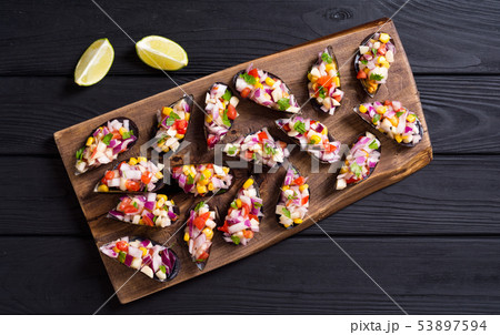 Traditional  Peruvian food background with mussels 53897594