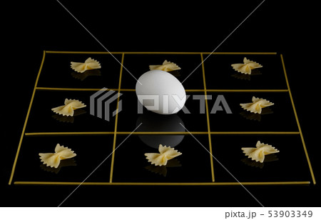 Pasta bows on a black background Pasta bows on a black background 53903349