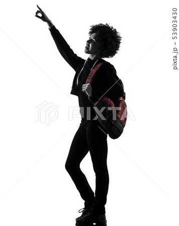 young teenager girl woman standing looking up shadow silhouette isolated 53903430