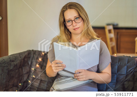 Teacher, tutor for homeschooling at the table 53911771