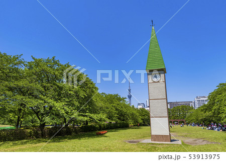 猿江恩賜公園の時計台と東京スカイツリーの写真素材