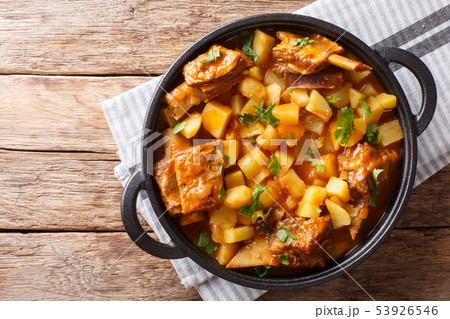 Slow cooked short beef ribs with potatoes in a Slow cooked short beef ribs with potatoes in a 53926546