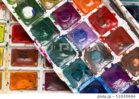 Closeup of messy, used water-color paint-box, water-color 53930694