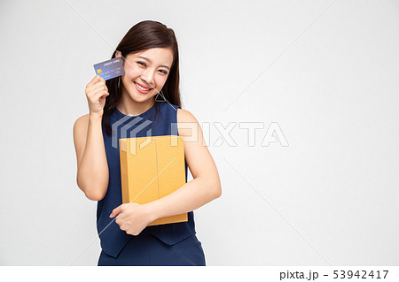 Happy Asian woman holding package parcel box ,card Happy Asian woman holding package parcel box ,card 53942417