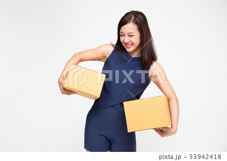 Happy Asian woman holding package parcel box, 53942418