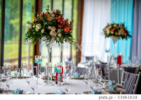 Bouquet of flowers and glasses on the wedding Bouquet of flowers and glasses on the wedding 53961638