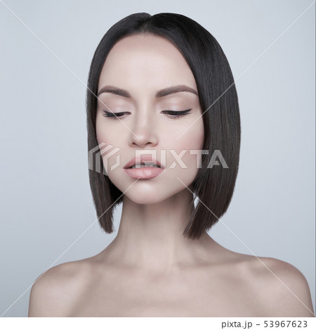 Fashion beautiful brunette with short haircut.  53967623