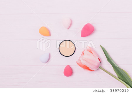 Creative flat layout of cosmetic beige foundation Creative flat layout of cosmetic beige foundation 53970019