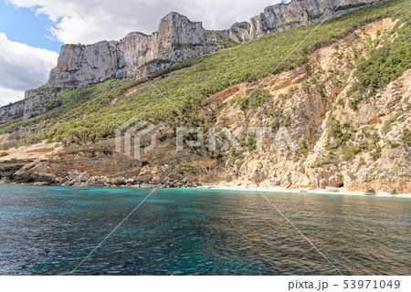 Sailboat off the coast of Sardinia - Italy 53971049
