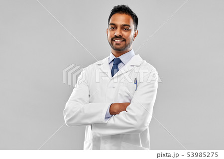 smiling male doctor or scientist in white coat smiling male doctor or scientist in white coat 53985275
