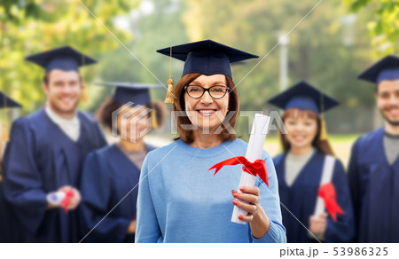 happy senior graduate student woman with diploma happy senior graduate student woman with diploma 53986325