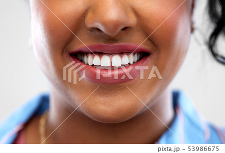 close up of african american woman white teeth close up of african american woman white teeth 53986675