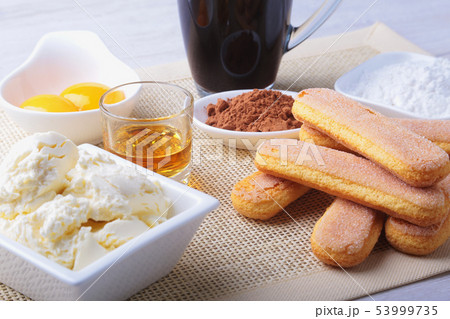ingredient for homemade tiramisu cake in close up. ingredient for homemade tiramisu cake in close up. 53999735