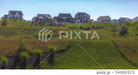 Homes with sloping grassy terrain in Daybreak Utah 54000323