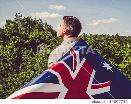 Handsome man waving the Flag of Australia Handsome man waving the Flag of Australia 54007735