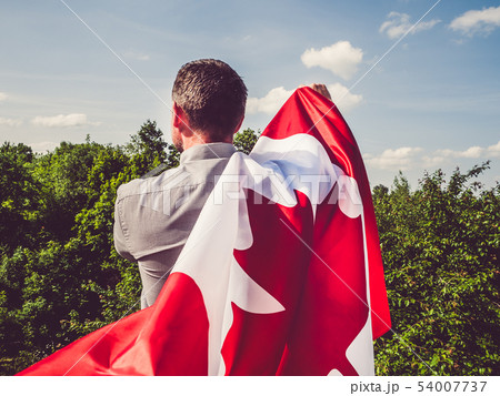 Man waving a Canadian Flag. National holiday Man waving a Canadian Flag. National holiday 54007737