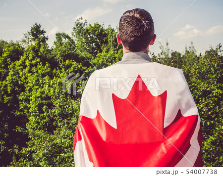 Man waving a Canadian Flag. National holiday Man waving a Canadian Flag. National holiday 54007738