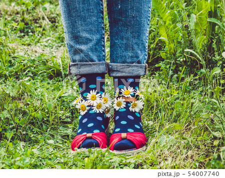 Women's legs, fashionable shoes and bright socks 54007740