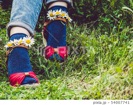 Women's legs, fashionable shoes and bright socks 54007741