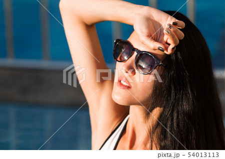 cute lady in a pool 54013113