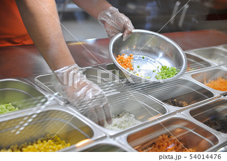 cooking in fast food restaurant 54014476