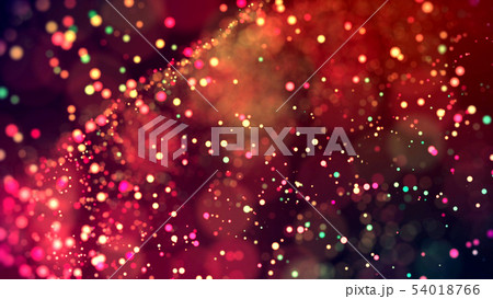 cloud of multicolored particles in the air like sparkles on a dark background with depth of field 54018766