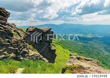 huge boulders in valley on top of mountain ridge 54019498