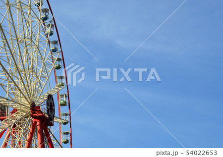 Entertainment Ferris wheel against the clear blue 54022653