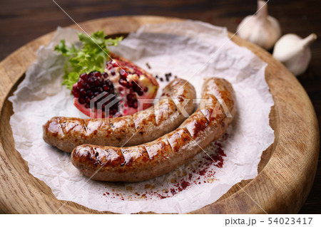 Grilled sausages served with spices Grilled sausages served with spices 54023417