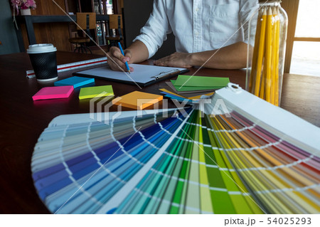 Graphic designer choose color bands samples. Graphic designer choose color bands samples. 54025293