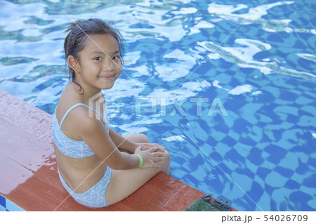 Happy Little Asian Girl At The Pool 54026709