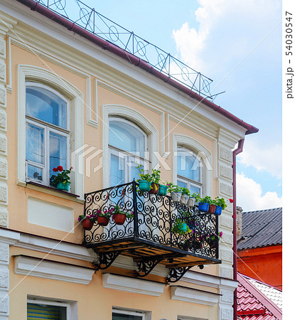 Balcony with blooming flowers 54030547