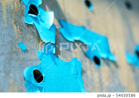Perforated Steel Sheet with Peeling Blue Paint. Perforated Steel Sheet with Peeling Blue Paint. 54030586