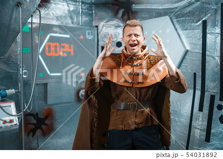 Scared space traveler, countdown on teleport board Scared space traveler, countdown on teleport board 54031892
