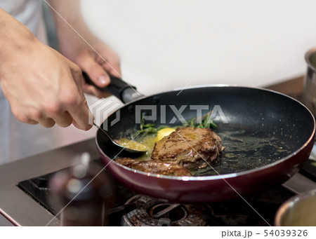 Chef cooking food in the kitchen, Chef preparing 54039326