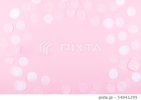 Pink background with confetti. Pink background with confetti. 54041295