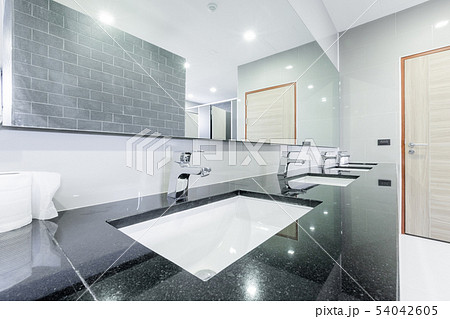 public Interior of bathroom with sink basin faucet 54042605