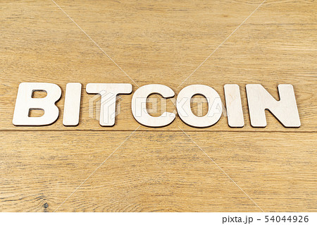 Word bitcoin on a wooden table 54044926