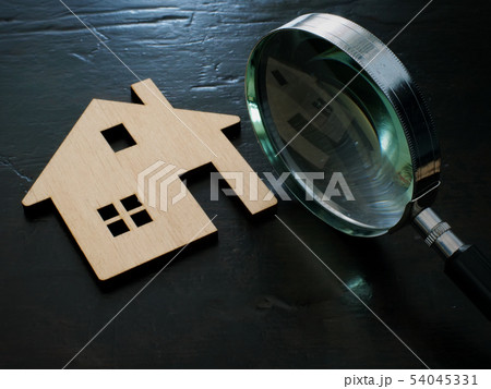 Property valuation. Magnifying glass 54045331