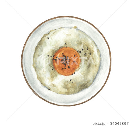 Raw egg and black sesame seeds on rice in a bowl. 54045397
