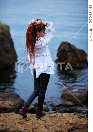 dreadlocks fashionable girl dressed in white 54048442