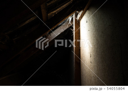 window light in dark old Abandoned Attic window light in dark old Abandoned Attic 54055804
