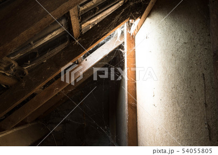 window light in dark old Abandoned Attic window light in dark old Abandoned Attic 54055805