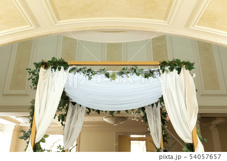 Beautiful wedding huppah decorated with fresh Beautiful wedding huppah decorated with fresh 54057657