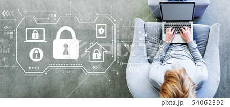 Security theme with man using a laptop 54062392