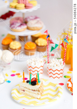 piece of cake on plate at birthday party 54064278