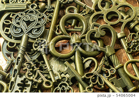 old vintage keys gold texture on copper coin old vintage keys gold texture on copper coin 54065004