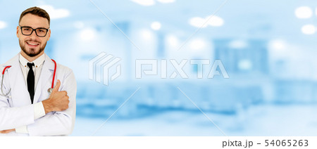 Young male doctor working at the hospital. 54065263