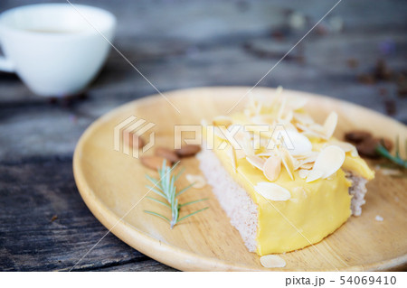 Cake and coffee cup on table. Cake and coffee cup on table. 54069410