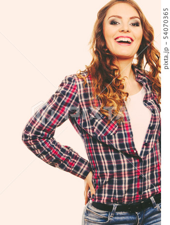 Attractive woman wearing checkered shirt 54070365